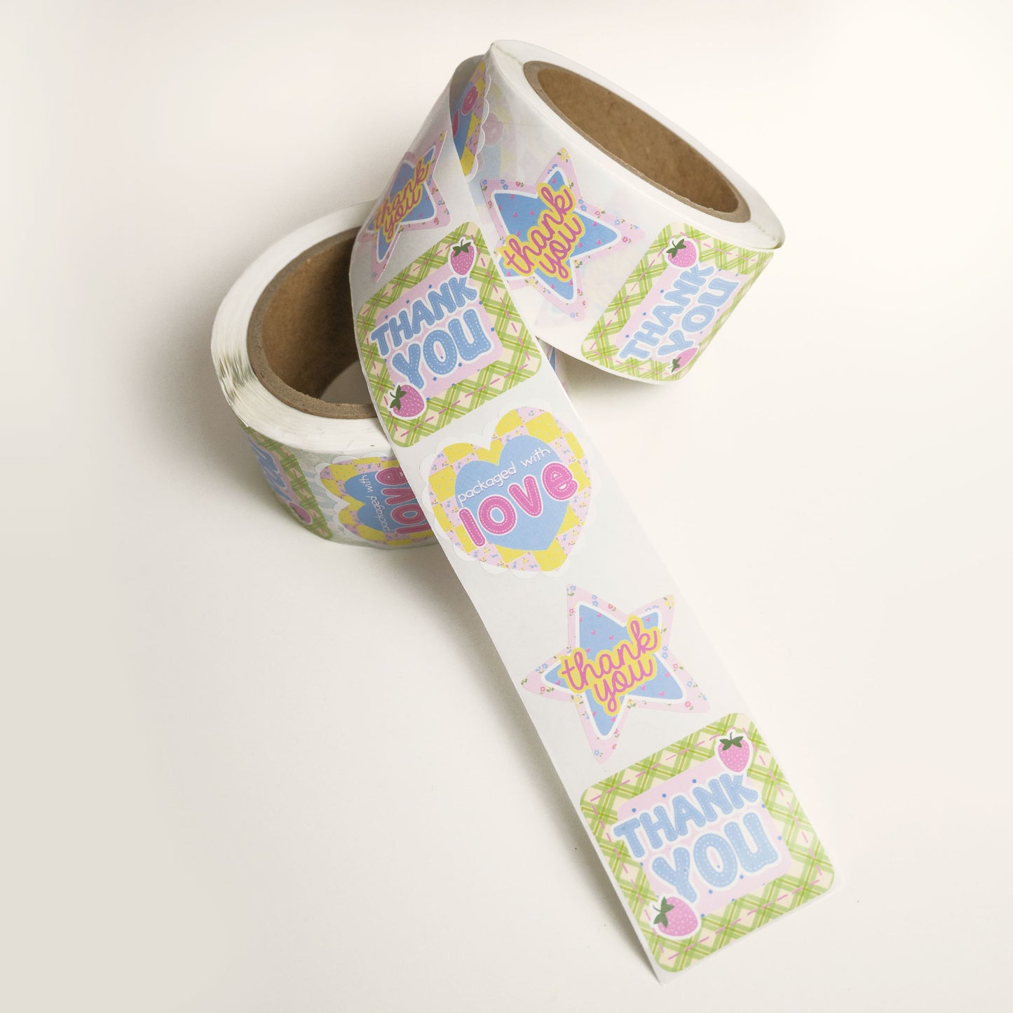 small business customer thank you stickers in patchwork style design with pinks, yellow, blues, and light greens with plaids, florals and strawberries.