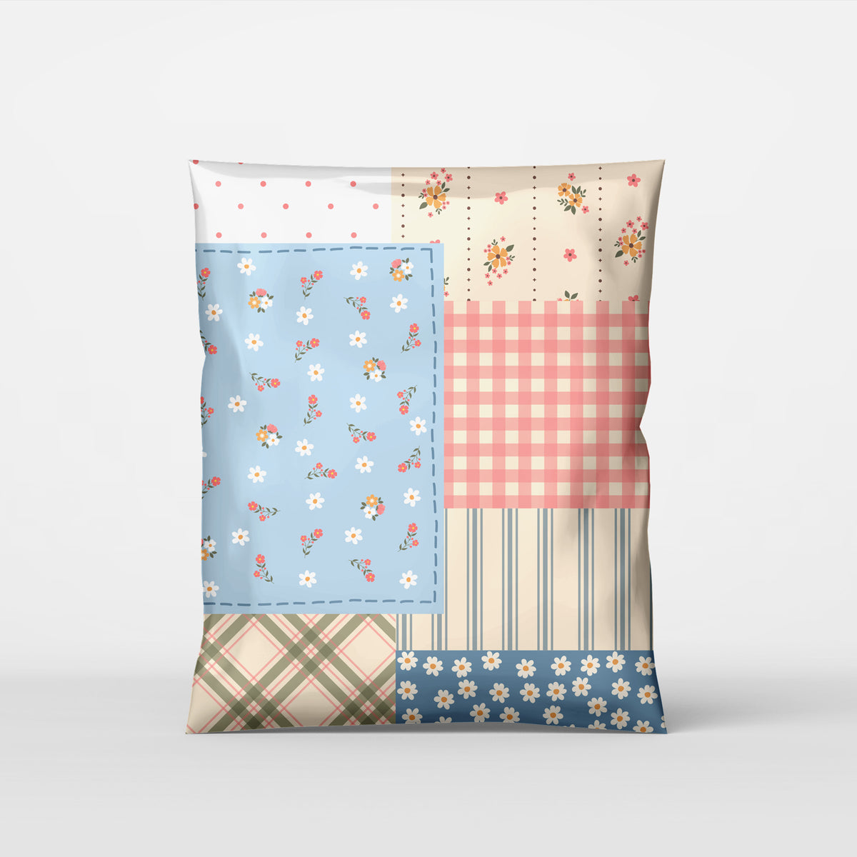 cute poly mailer shipping bag  in patchwork design with florals, plaids, & stripes for small business mailing. Polymailer is muted blues, pinks and cream design colors. Good for t-shirts, clothes, and handmade boutique items.