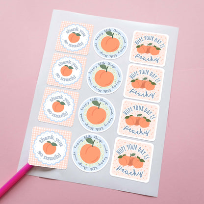 A set of customer packaging stickers that contain customer thank you messages like thank you so much! and happy little things inside and hope your day is peachy.  Features cute peaches, peach and light blue colors.